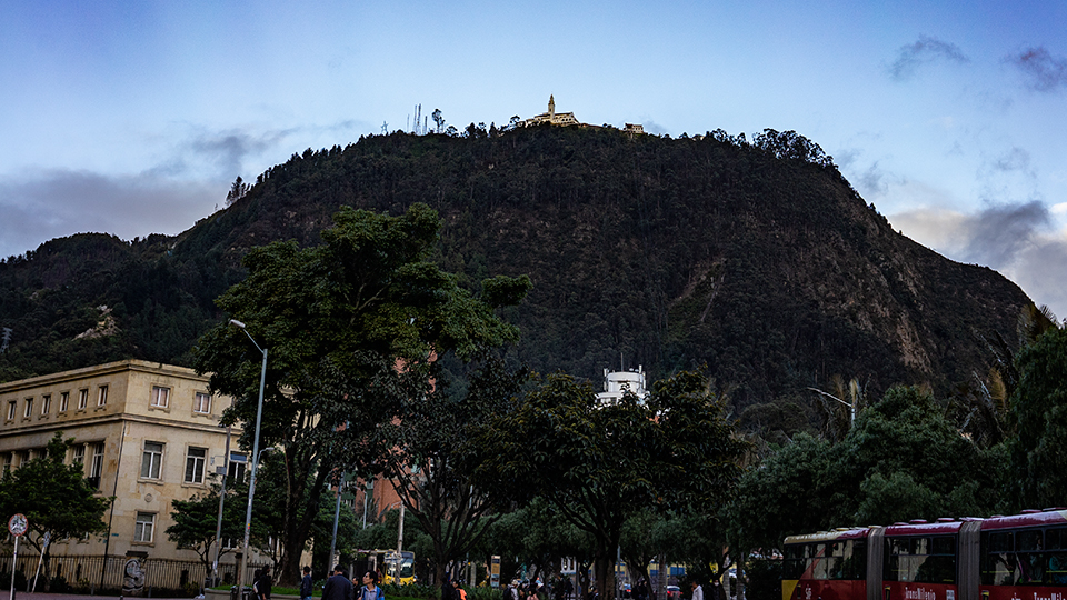 Santuario de Bogotá seen from the streets below. The little bit of exposed rock above the building to the left is actually part of the path to the top.