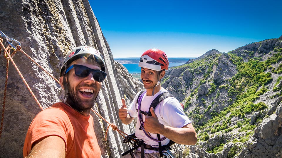 Mak and I topping out Centralni Kamin 5a (5.8)
