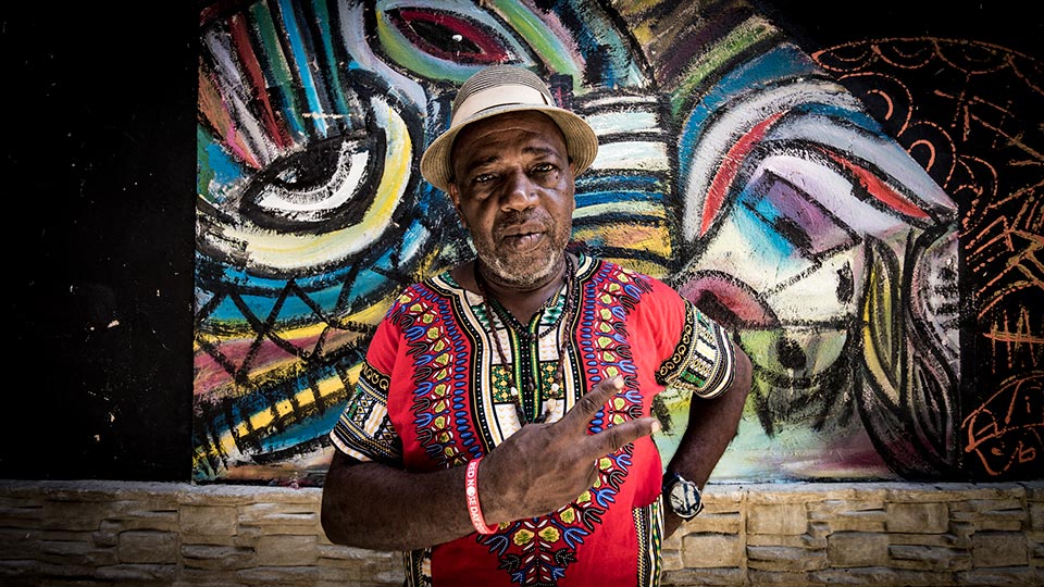 Miguel posing for a photo in an art district in Havana, Cuba. I met him while walking around and after he showed me a few sites we shared a mojito together!