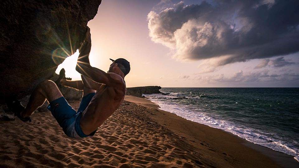 Will pulling moves on a cool V4/V5 climb at a beach bouldering spot near Loiza, a short 15 minute drive from Isla Verde. I visited this here several times through my stay in PR and there was never anyone there. The perfect secluded beach spot!