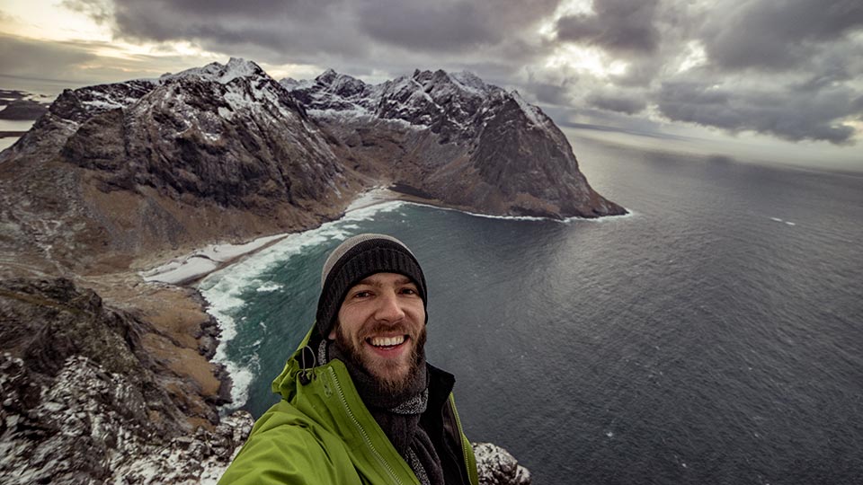 Selfies from the top of Ryten with Kvalvika in the background.